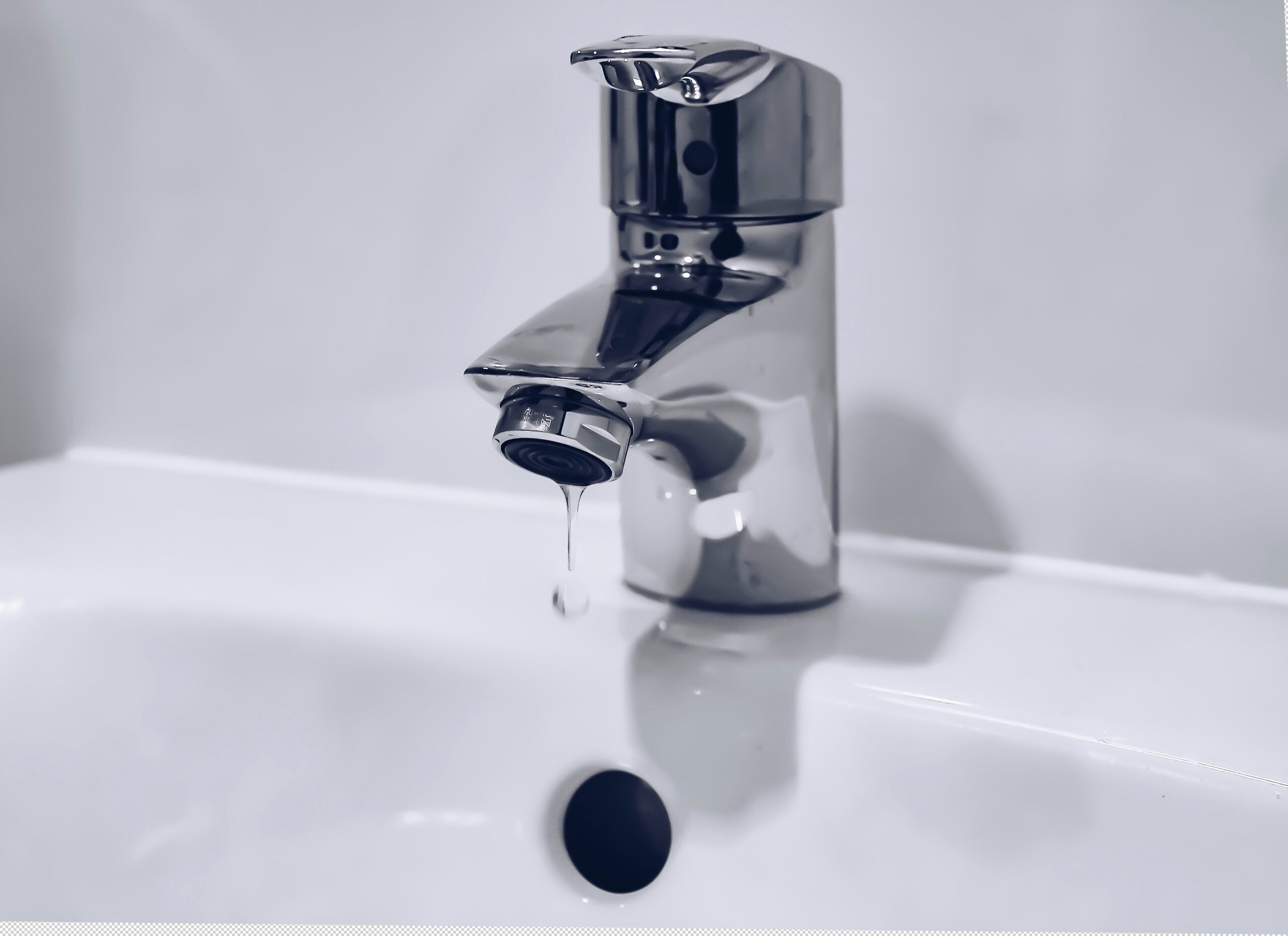 clean white sink with water droplet